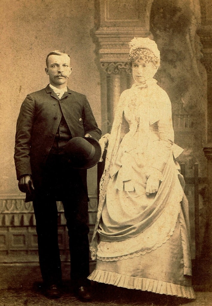 Marriage Records by popular US online genealogists, Price Genealogy: black and white image of a married couple. 