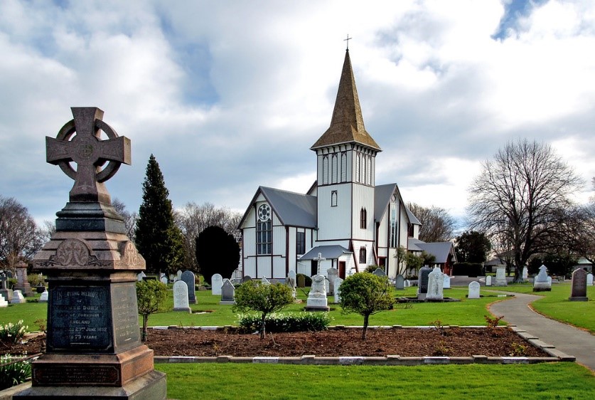 Children Who Died Young by popular US online genealogists, Price Genealogy: image of a white church and a cemetery. 
